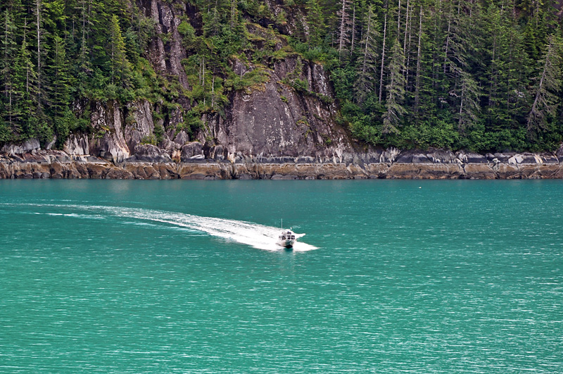 Here comes the Alaskan Navigator to board our ship