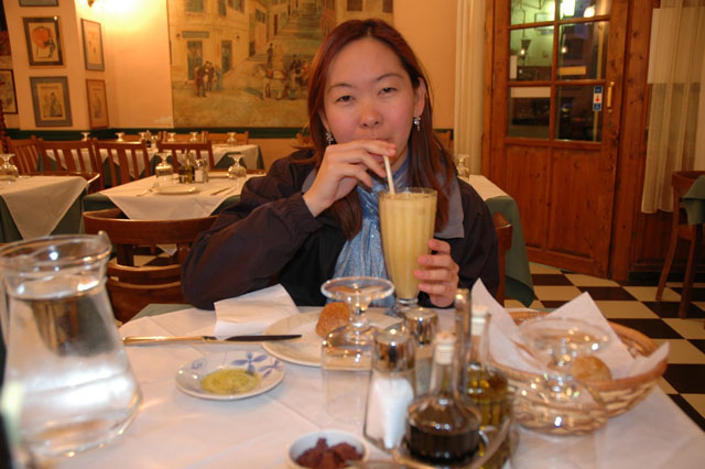 Charlotte_enjoys_a_mango_lassi_at_Eden.jpg