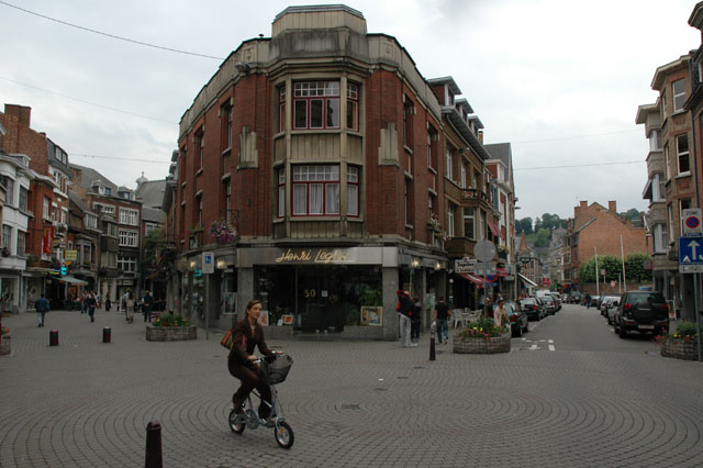 A_local_rides_an_interesting_bike_through_town.jpg