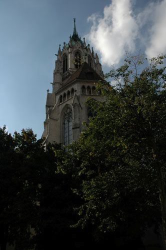 Church_peeking_through_the_trees.jpg