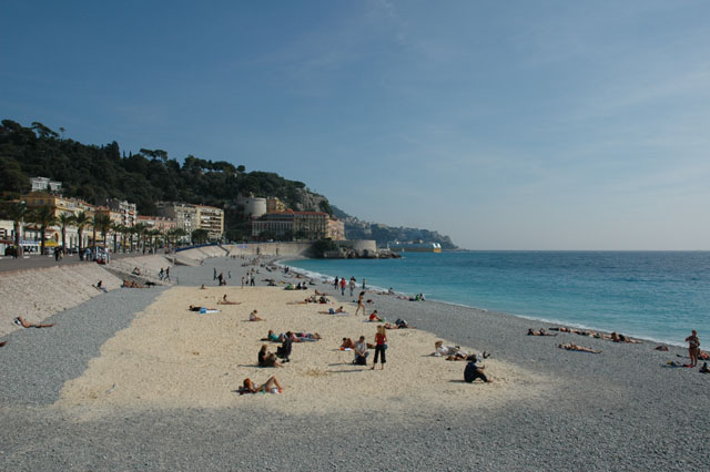 A_man_made_sand_beach_in_the_rocky_beach.jpg