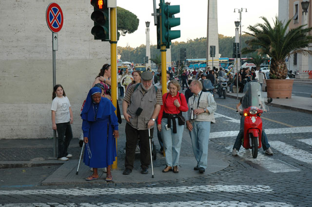 Tourists_rub_elbows_with_the_Catholics_to_see_the_sights_here.jpg