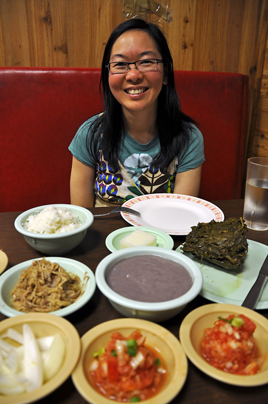 Charlotte admiring the food at Ono Hawaiian.jpg