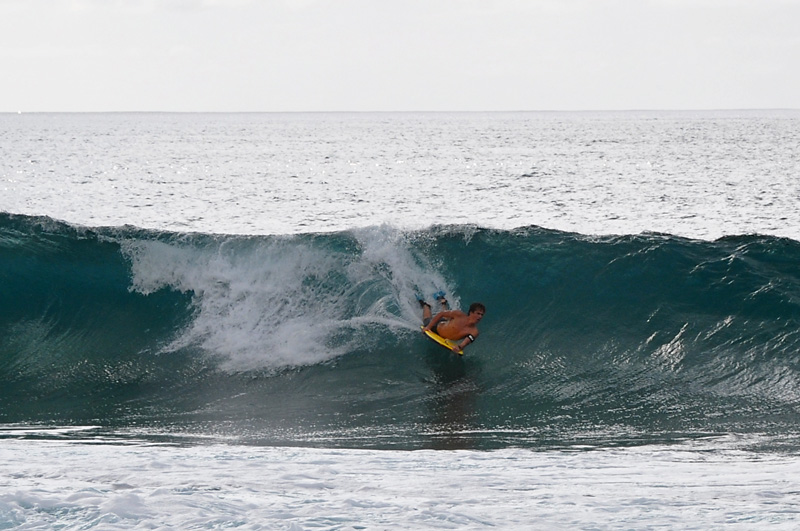 Dude bodyboarding at the Pipeline.jpg