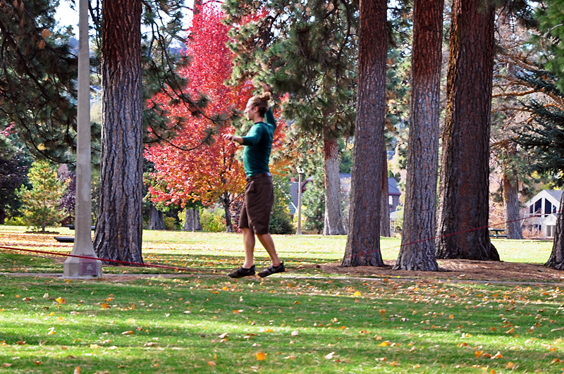 Someone practicing tightrope walking in the park.jpg