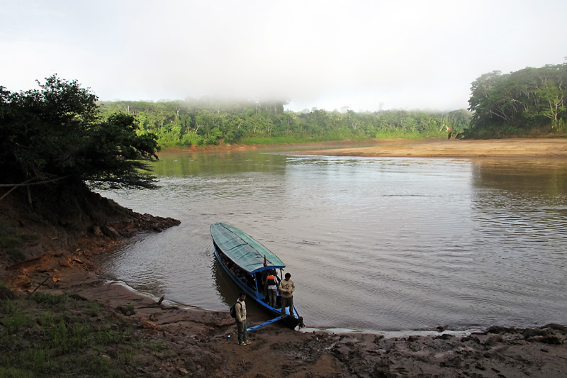 Loading up the boat to head downriver for the parrot lick hike.jpg