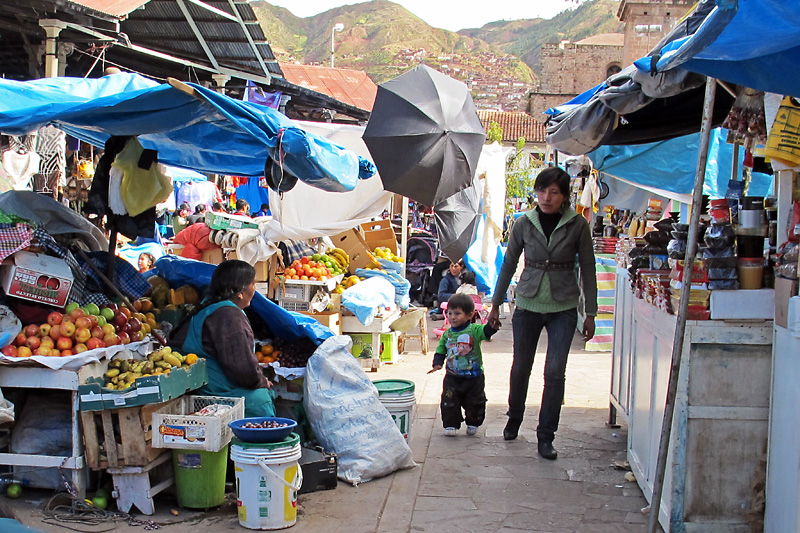 Mom and kid walking the market.jpg