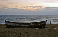 Boat_on_the_west_coast_Peloponese_beach.jpg