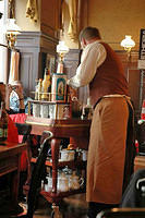 Old_school_waiter_at_Cafe_Sperl.jpg