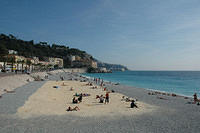 A_man_made_sand_beach_in_the_rocky_beach.jpg