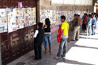 Reading the daily news in the Plaza De Armas